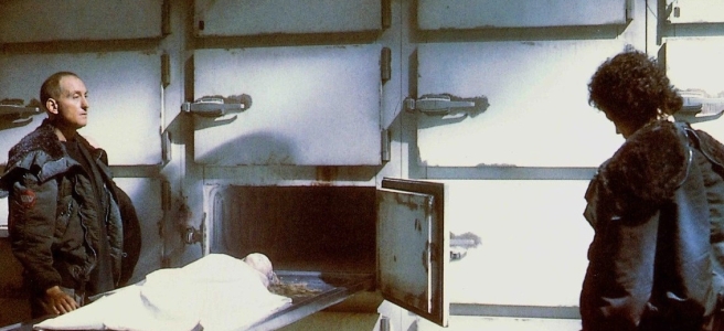 A scene from 'Alien 3' depicting characters Clemens and Ripley in a morgue.